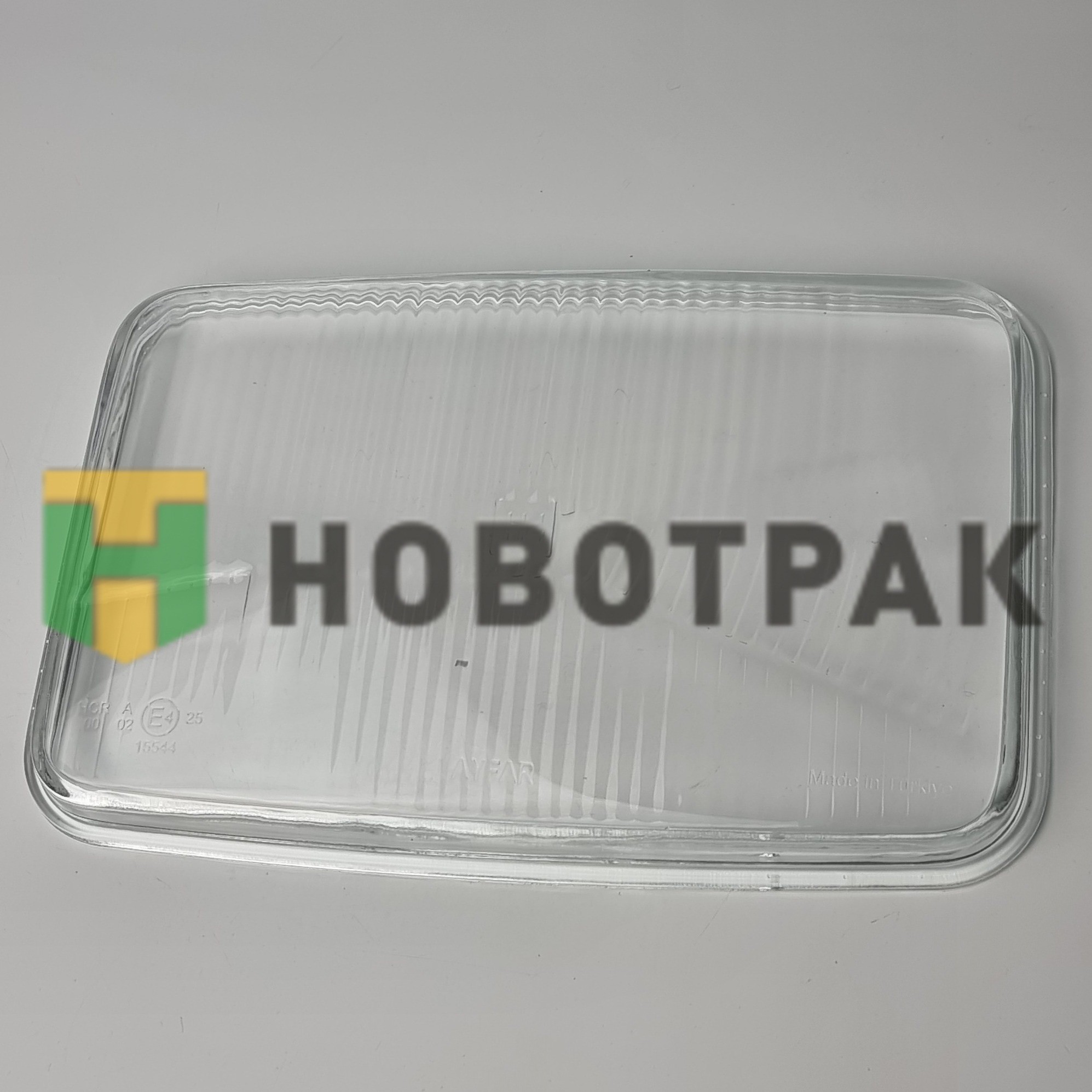 Стекло фары MAN C11555