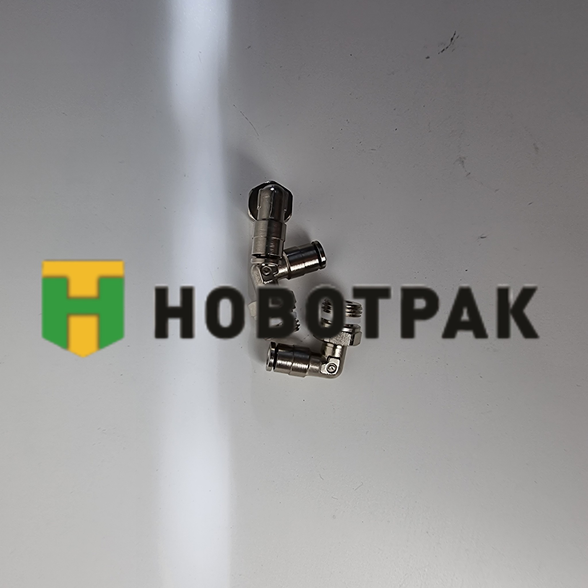 Фитинг угловой поворотный