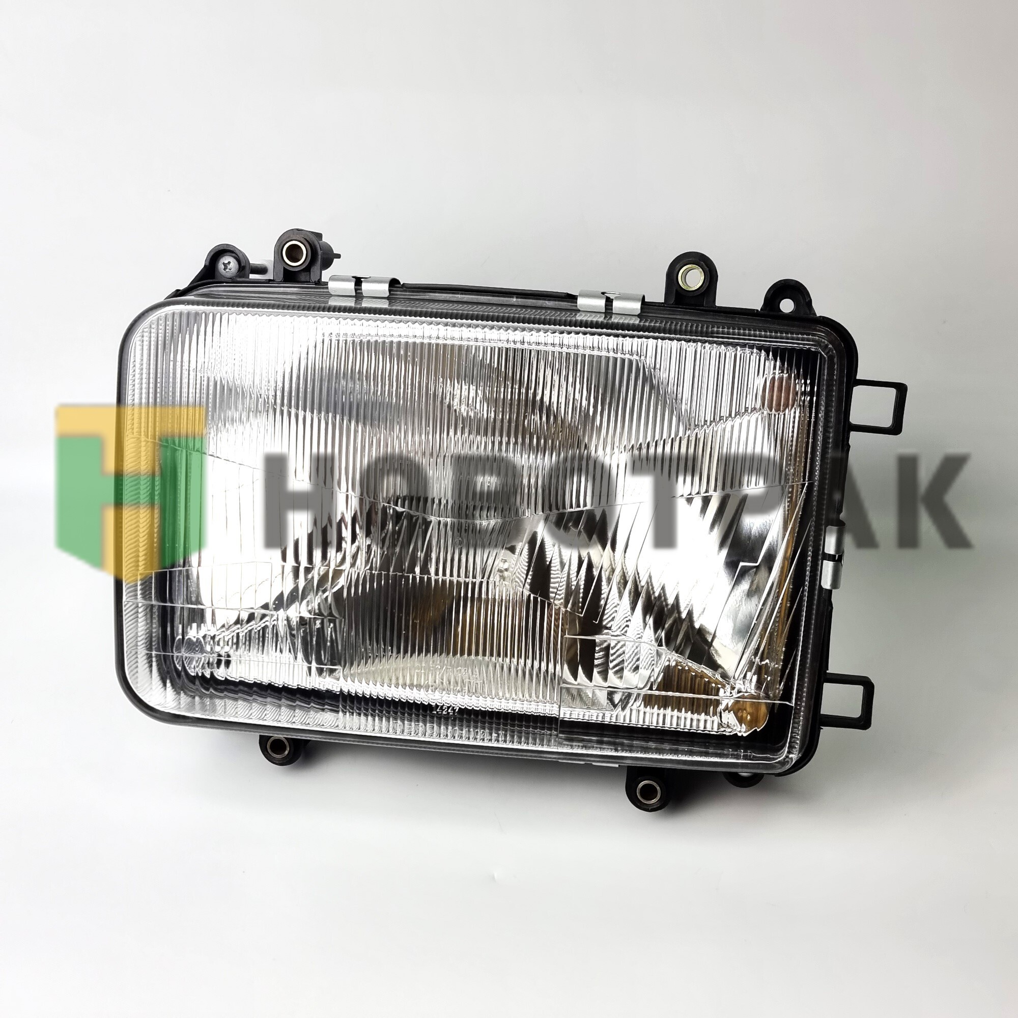 Фара головного света левая DAF 4501102LLDEN