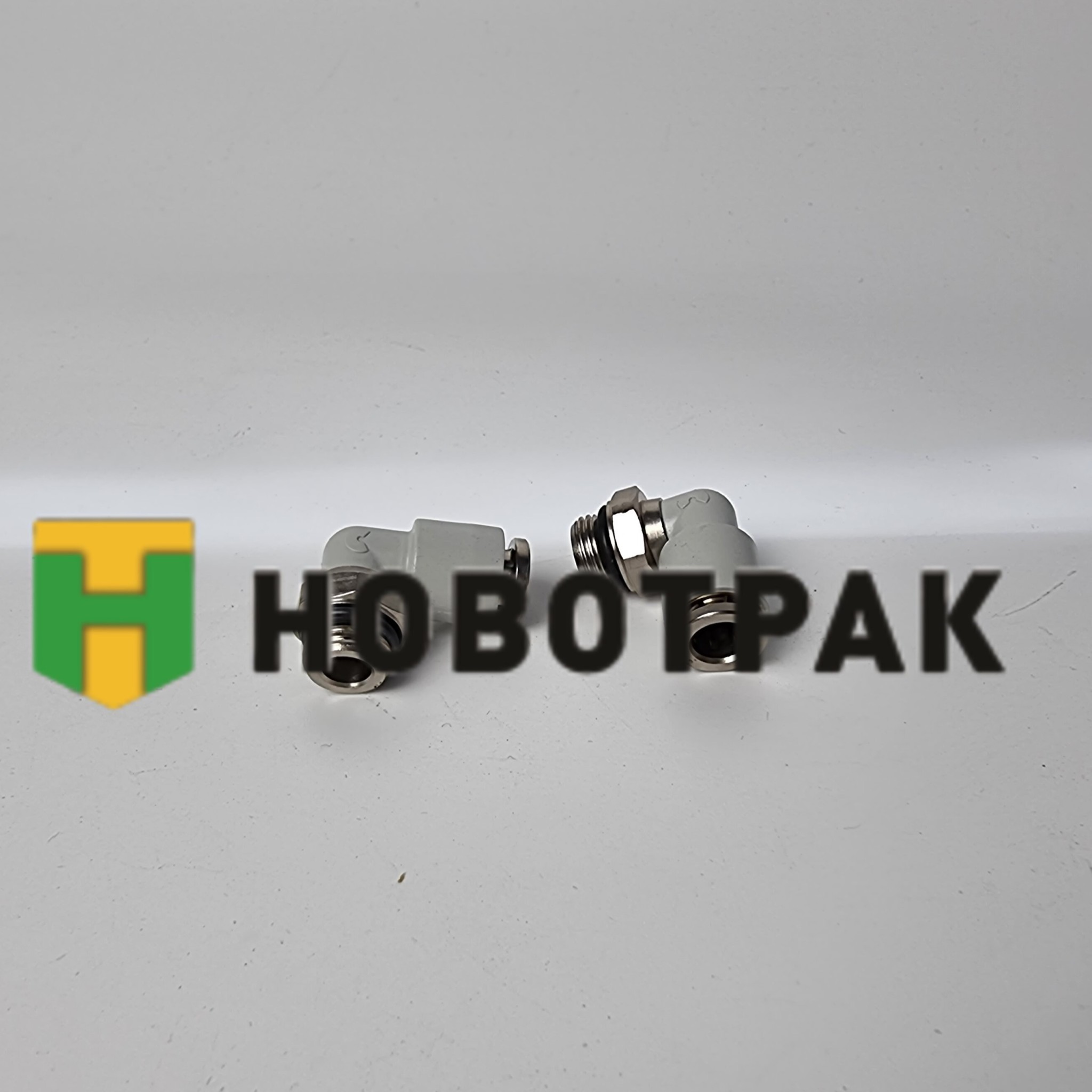 Фитинг угловой поворотный