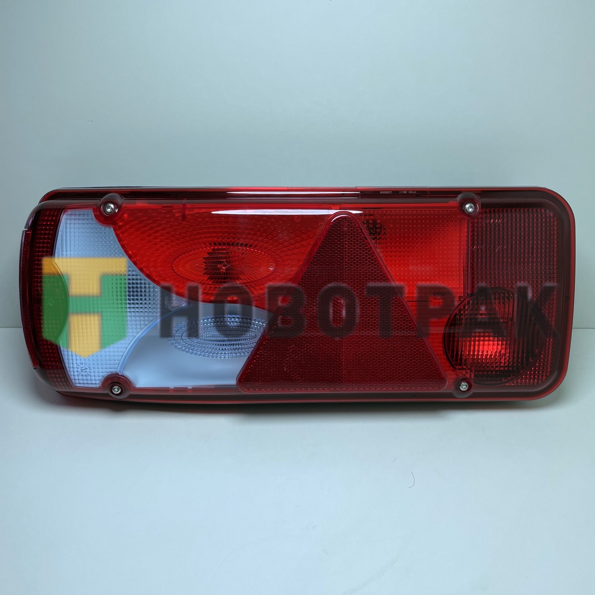 Фонарь задний прицепа (с треугольником) левый