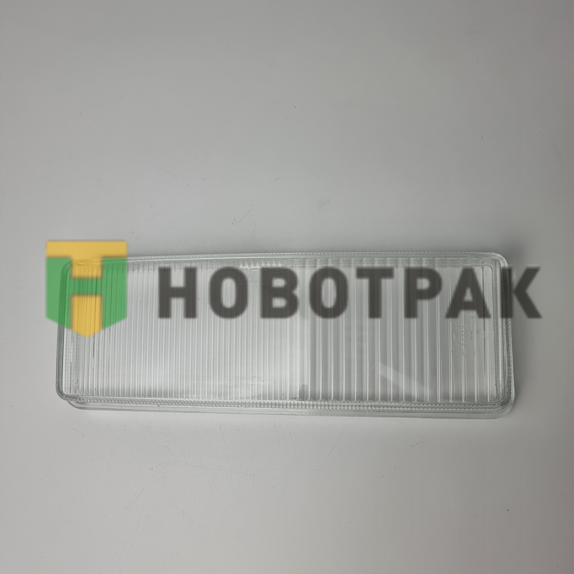 Стекло фары M692010