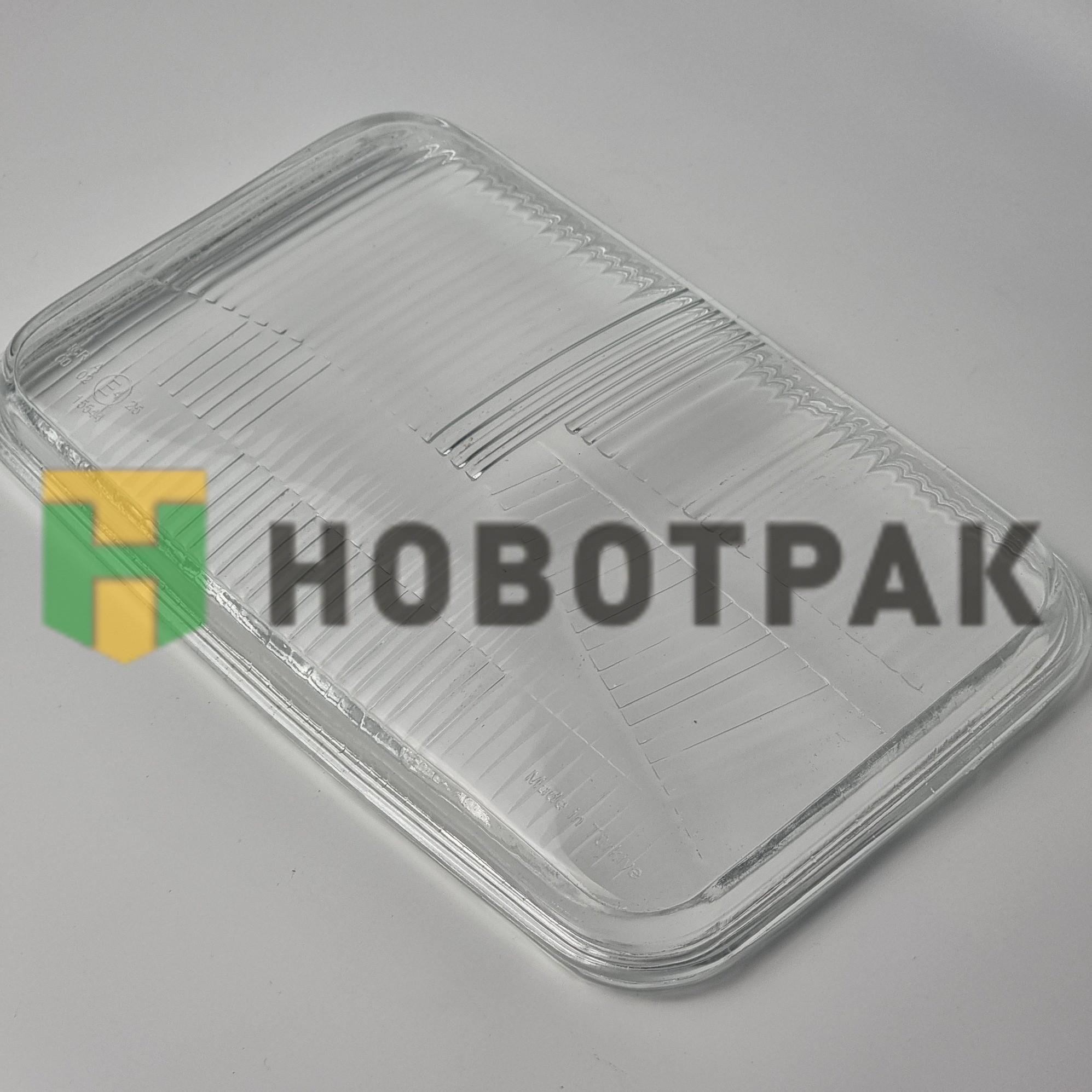 Стекло фары Scania C11524