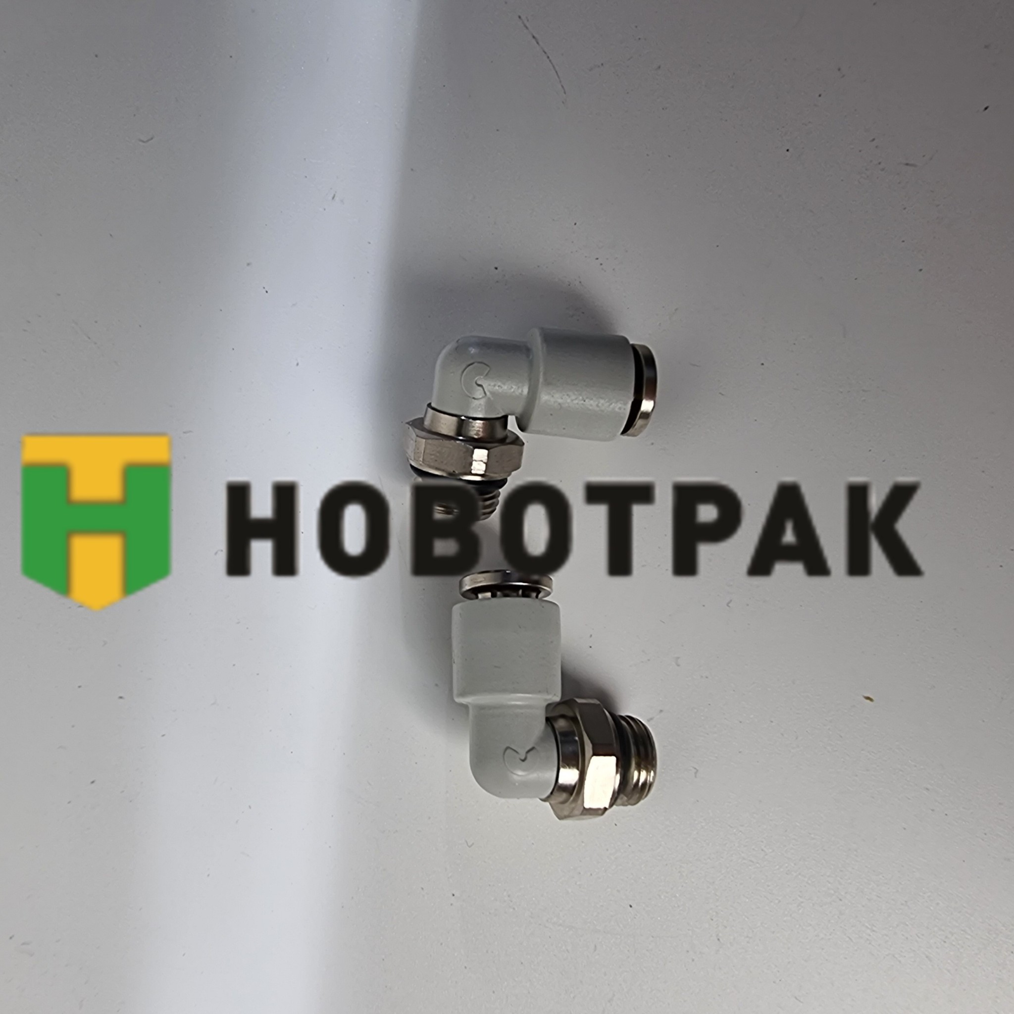 Фитинг угловой поворотный