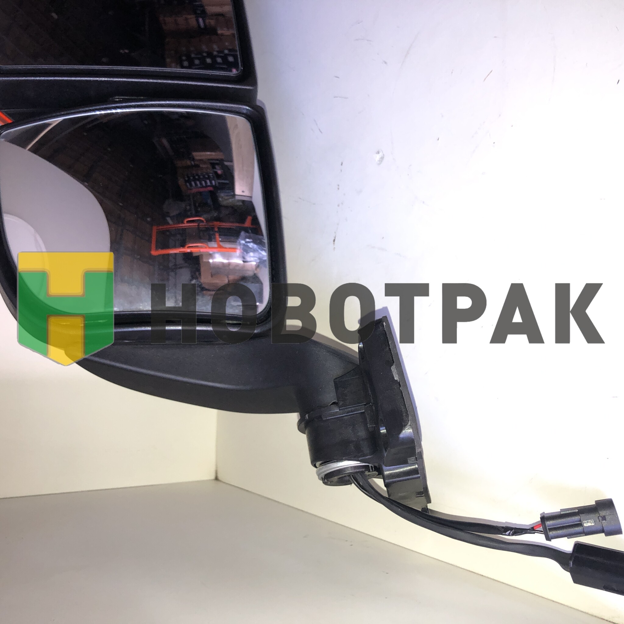 Зеркало заднего вида левое в сборе Sitrak C7H MAX 712W637300001