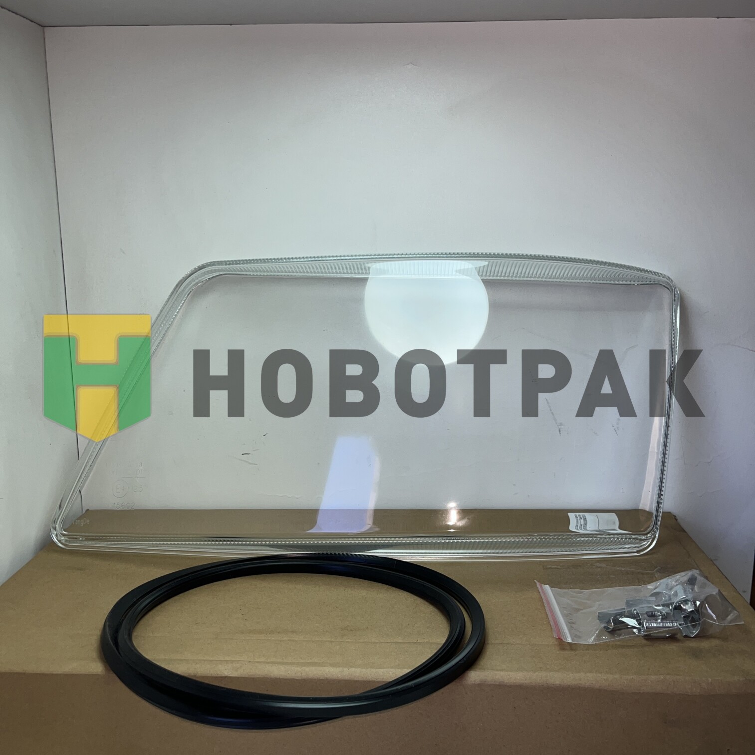 Стекло фары MAN TGX,TGS левое TD0157015ALSR